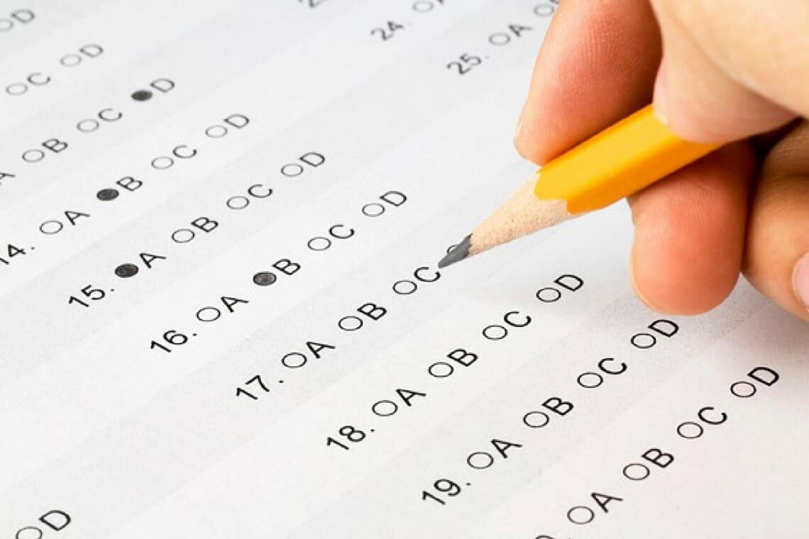 exames de proficiência TOEFL, IELTS GRE ou GMAT